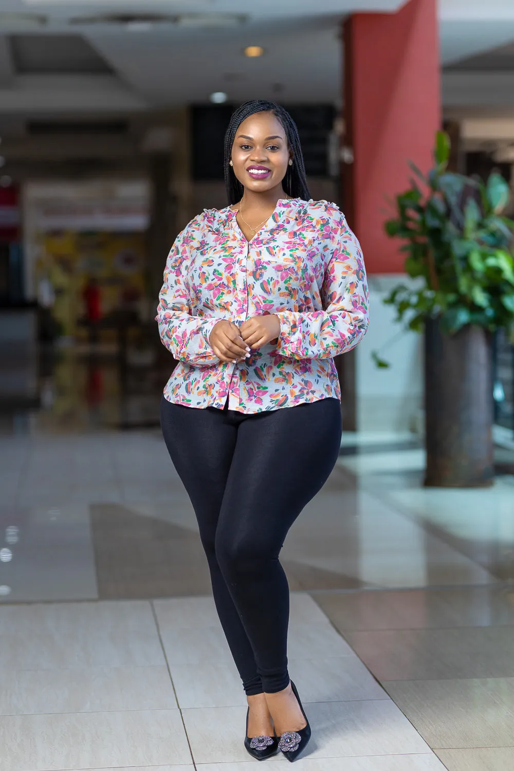 Bright green floral pilot top